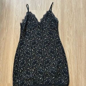 by the way. Black Dress with Gold Details